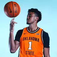 Anthony Felesi spinning a basketball on finger