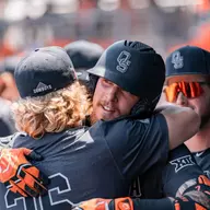 Meola hugs Wech vs. Arizona