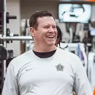 Rob Glass in a weight room.