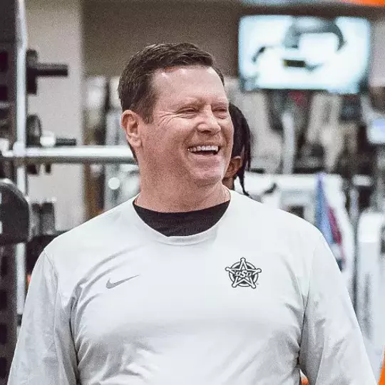 Rob Glass in a weight room.
