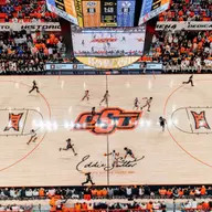 Wide shot of game action on Eddie Sutton Court