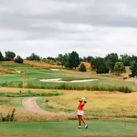 Lucy Darr teeing off