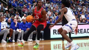 View game action images as Rutgers men's basketball takes on Seton Hall in the Garden State Hardwood Classic.