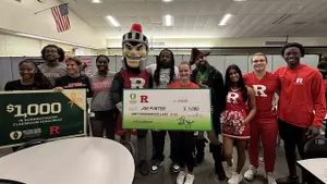 Former Two-Sport Standout Joe Porter Honored with Extra Yard for Teachers Award Image