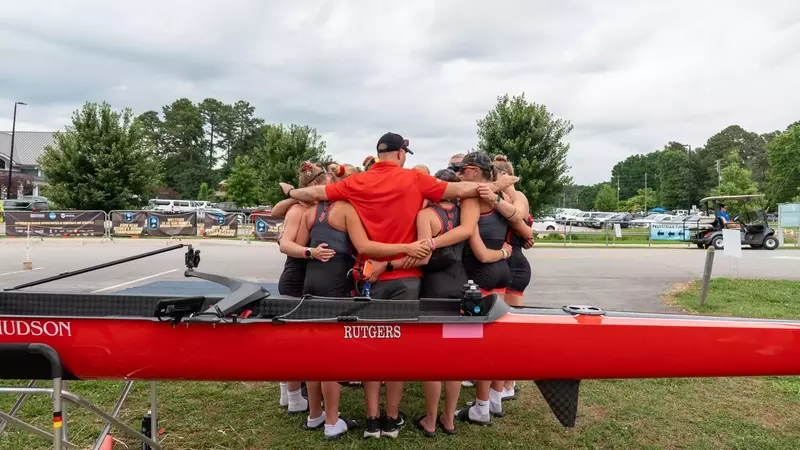 Rutgers women's rowing huddles prior to the start of the 2026 NCAA Championship semifinals at Lake Lanier in Gainesville, Georgia