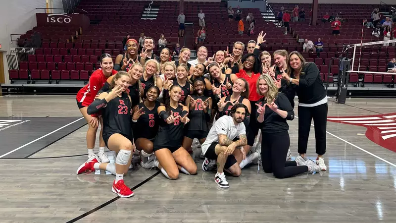 Rutgers volleyball celebrates following its win over Evansville