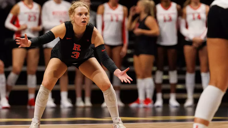 Kenzie Dyrstad prepares to recieve the ball against Vanderbilt at Memorial Gymnasium during the Big Ten/SEC Challenge