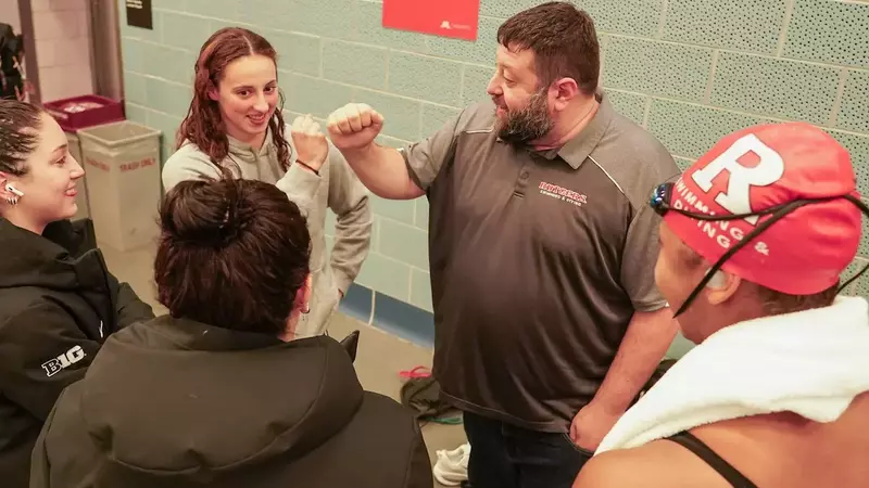 Rutgers Swimming Coach Jon Maccol with Swimmer Anna Vlachou