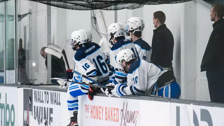 PCS MHockey Team on the Bench