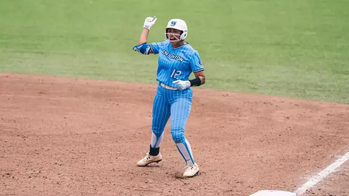 Erika Perez provides an empathic fist pump after driving in the game-winning run at the BIG EAST Tournament.