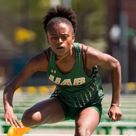 Dereje Breaks 400m Hurdles School Record