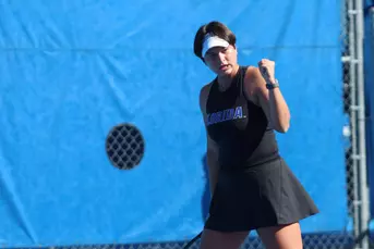 Valery Gynina celebrates after winning a point vs. Troy