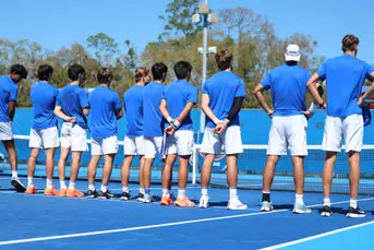 Men's Tennis during announcements team prior to the start of doubles play.