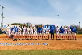 The Florida softball team celebrates after a win over Kentucky