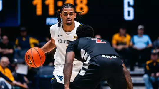 West Virginia battles Cincinnati in its Big 12 Conference home opener at Hope Coliseum on Jan. 6, 2026.