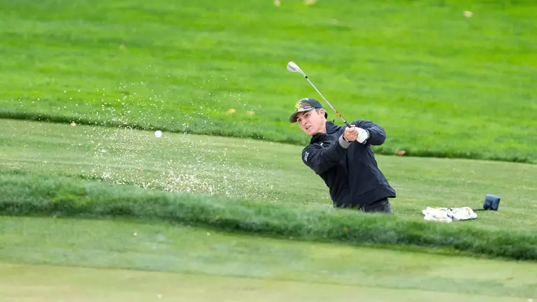 Ryan Leach hits a shot in Big 12 Match Play