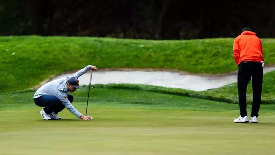 Jack Michael lines up a putt