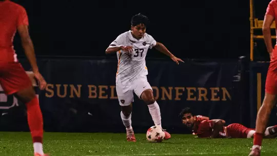Juan Alvarez in action for WVU men's soccer against Duquesne