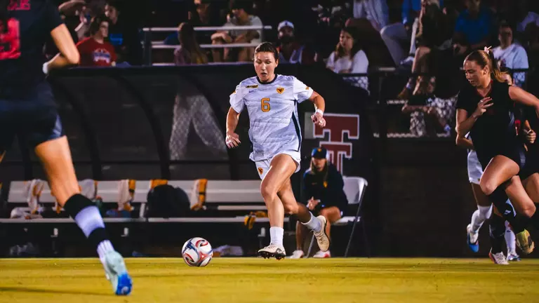Maya Leoni dribbles a ball down the field at John Walker Soccer Complex in Lubbock, Texas.