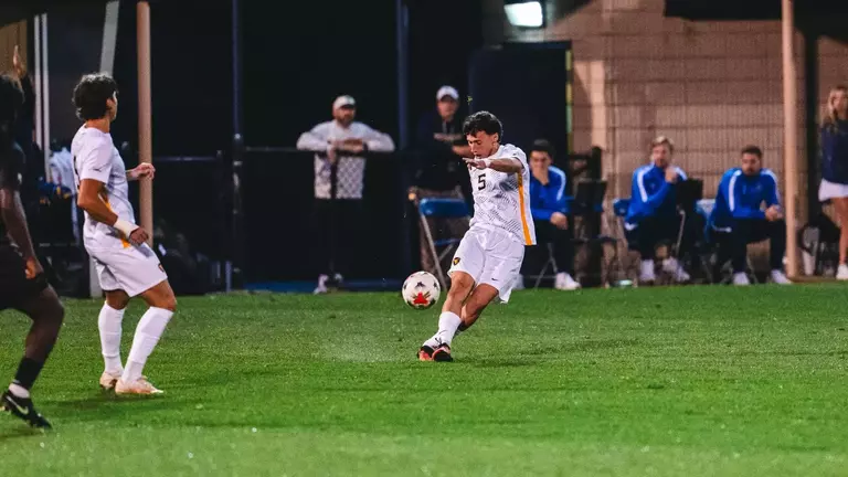 Nacho Martinez kicks the ball against South Carolina