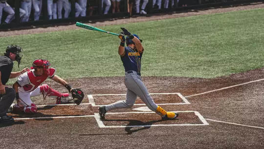 Maxwell Molessa swings and hits a go-ahead two-run single in the 13th inning against Cincinnati