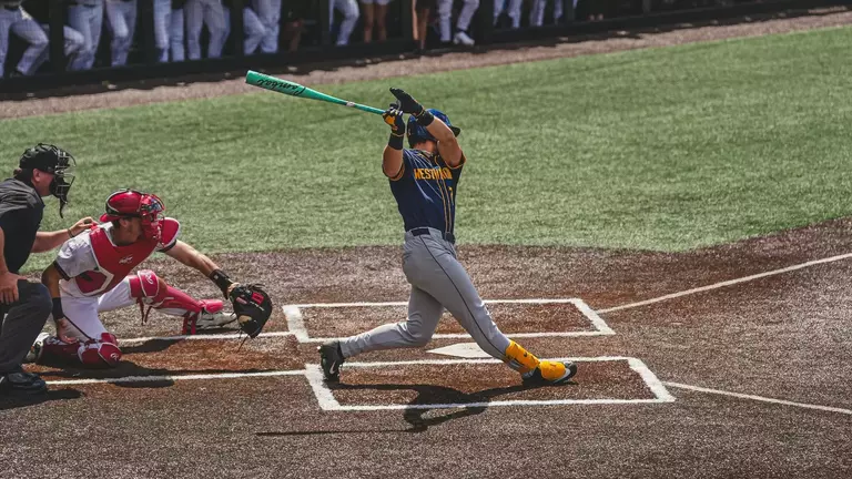 Maxwell Molessa swings and hits a go-ahead two-run single in the 13th inning against Cincinnati