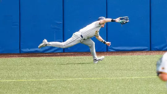 Centerfielder Paul Schoenfeld extends to make a great diving catch in West Virginia's 4-1 victory over ninth-ranked Kansas at Hoglund Ballpark in Lawrence, Kansas, on Friday, May 8, 2026.