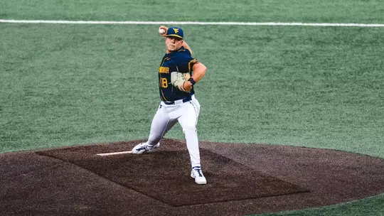 Ian Korn throws a pitch against TCU