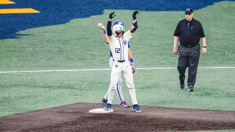 Brodie Kresser celebrates after hitting a double against TCU