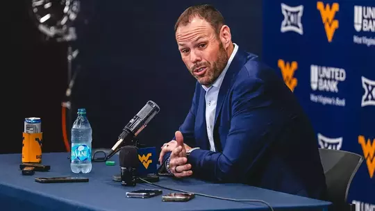 WVU Vice President and Director of Athletics Wren Baker visits with media in the Team Room inside the Milan Puskar Center on Tuesday, May 19, 2026.