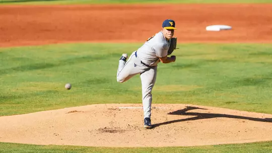 Ian Korn throws a pitch against Kansas