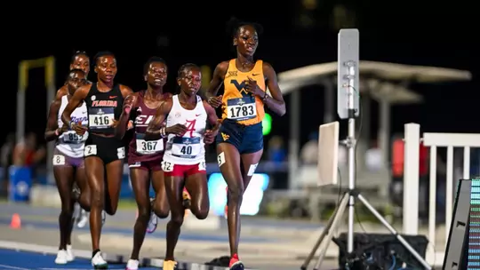 Joy Naukot competing in the 10,000 meters at the NCAA East First Round