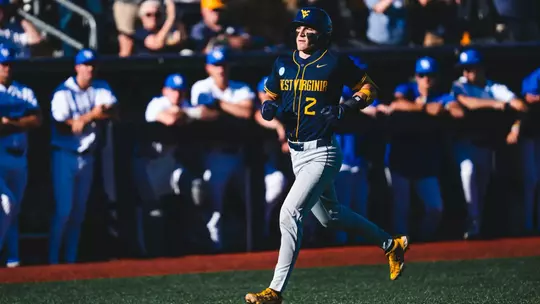 Gavin Kelly rounds the bases after hitting a home run against Kentucky.