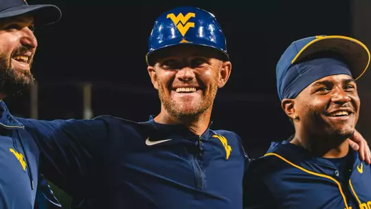 West Virginia University baseball coach Steve Sabins celebrates his team's 7-2 victory over Marshall at GoMart Ballpark in Charleston, W.Va., on Tuesday, May 5, 2026.