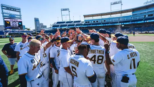 Baseball Team Huddle postgame after a game against North Carolina at the College World Series