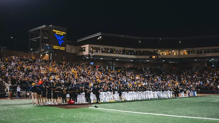 WVU baseball players sing Country Roads after winning the NCAA Morgantown Regional.