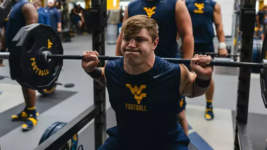 West Virginia junior offensive lineman Nick Krahe working out during the summertime at Milan Puskar Stadium.