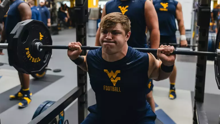West Virginia junior offensive lineman Nick Krahe working out during the summertime at Milan Puskar Stadium.