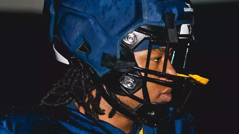 Junior defensive lineman Nate Gabriel takes a break during a fall training camp practice inside West Virginia's Caperton Indoor Practice Facility in Morgantown, West Virginia.