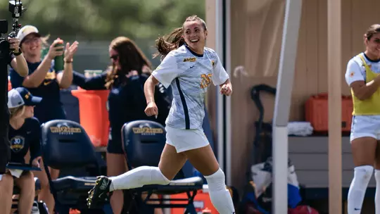 Sophia Nickel celebrates following her goal against Duquesne.