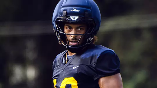 Linebacker Cam Torbor takes part in a drill during preseason football practice on the Steve Antoline Family Practice Facility in August, 2026.