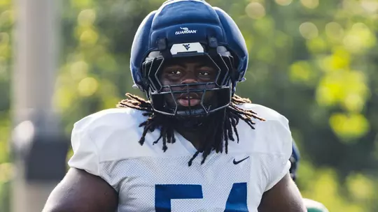 West Virginia junior offensive lineman Amare "Bubba" Grayson takes part in a preseason practice on the Steve Antoline Family Practice Facility in Morgantown, West Virginia.