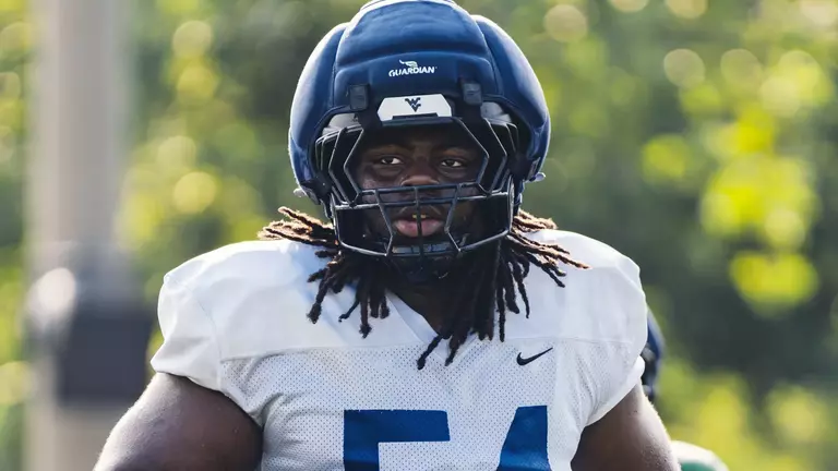 West Virginia junior offensive lineman Amare "Bubba" Grayson takes part in a preseason practice on the Steve Antoline Family Practice Facility in Morgantown, West Virginia.