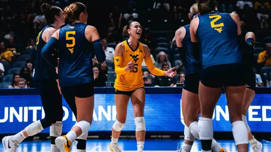 The team celebrates after a point versus UTRGV