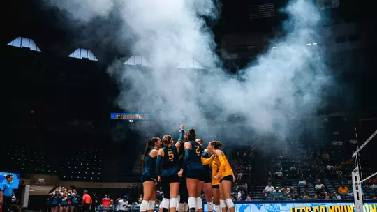 The team huddles before a match starts
