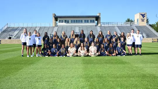 The WVU women's soccer team poses for a team photo on July 23, 2026 at Dick Dlesk Soccer Stadium.