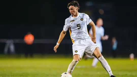 Nacho Martinez controls the ball for WVU men's soccer in a game against Georiga State