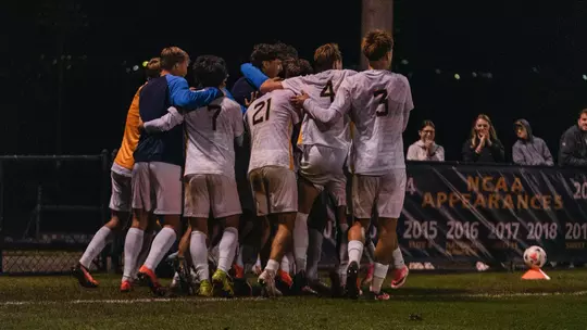 West Virginia celebrates after Sammie Walker scores a goal against Duquesne