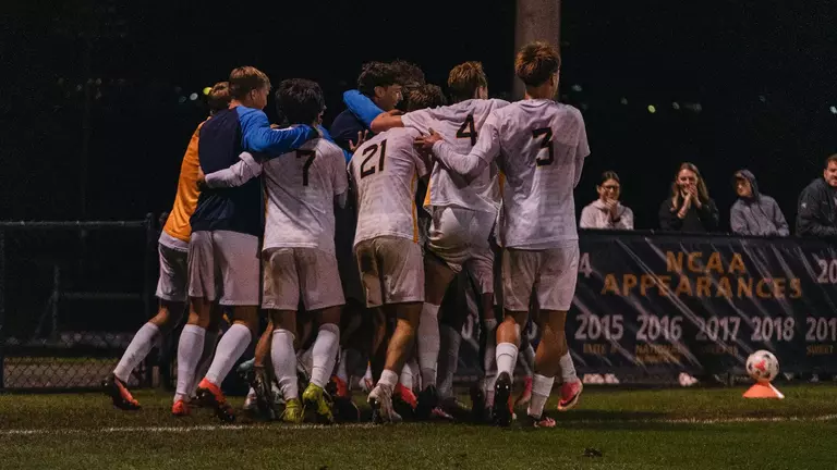 West Virginia celebrates after Sammie Walker scores a goal against Duquesne