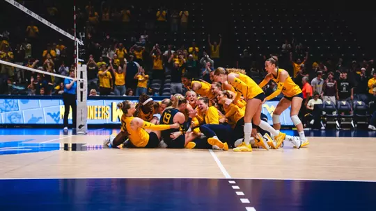 WVU Volleyball Celebrates after defeating No. 9 Arizona State